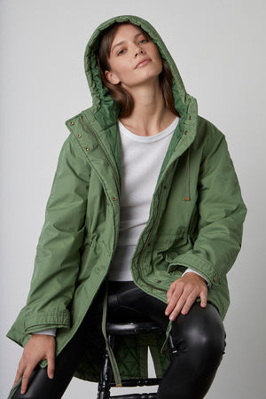 Nicki Jacket Evergreen Hood Up Berdine Leggings Front 