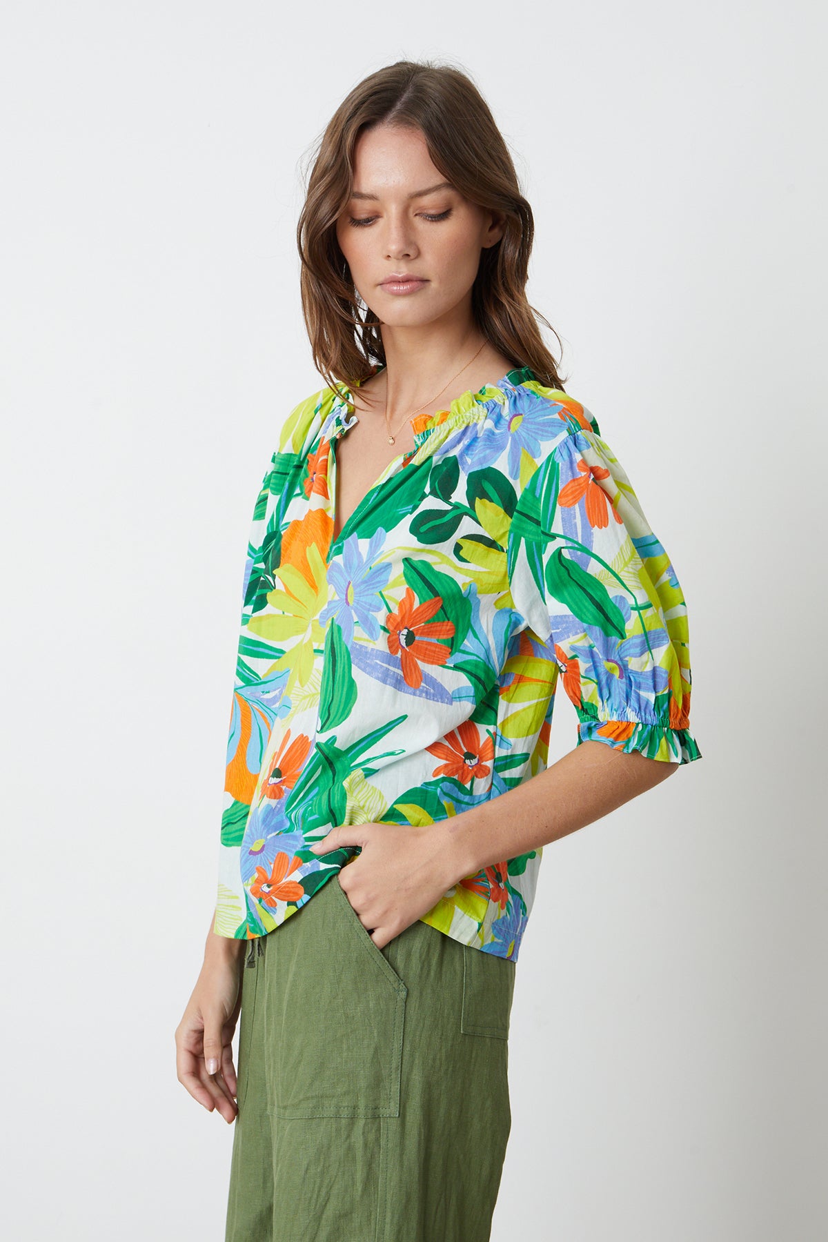 Carrie Boho Top in bold floral mahalo print with blues, greens, orange and yellow green and Dru Pant in basil side-26255708815553