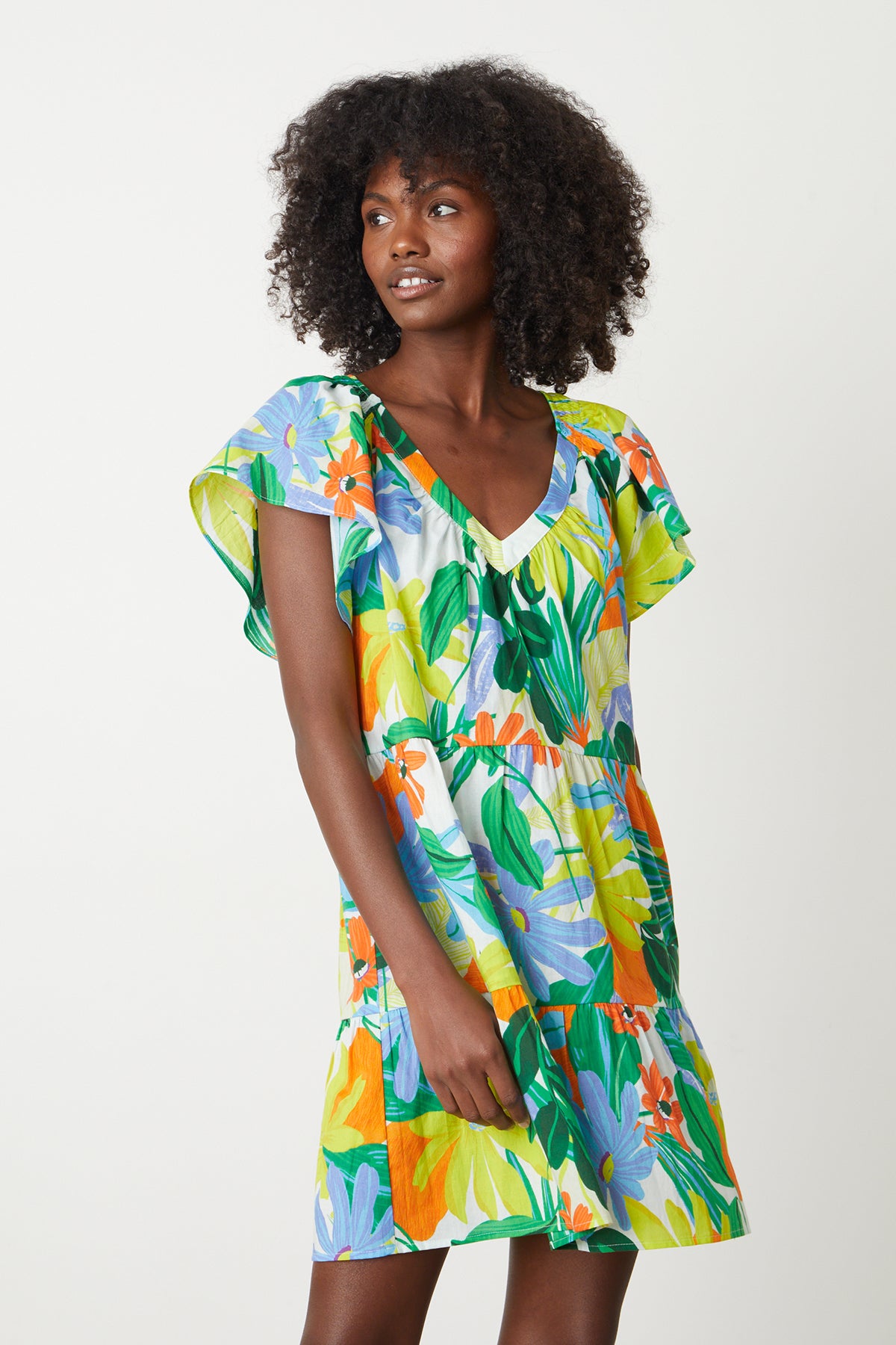   Maeve Tiered Dress in bold floral mahalo print with blues, greens, orange and yellow green front 