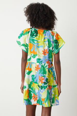 Maeve Tiered Dress in bold floral mahalo print with blues, greens, orange and yellow green back