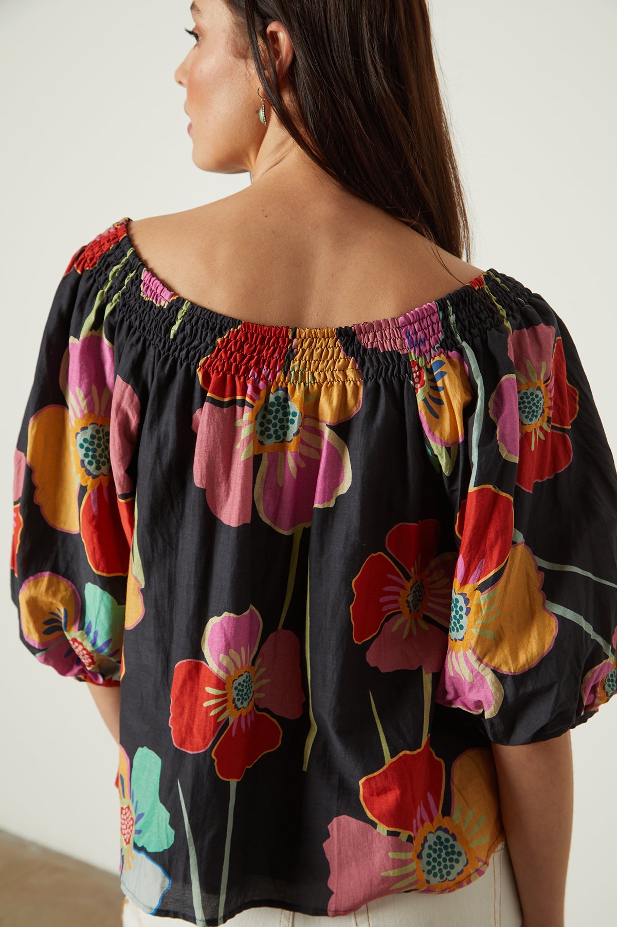   Jasmine Top in bold floral with black background back close up 