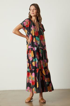 Savannah Maxi Dress in bold floral print on black background full length front untied