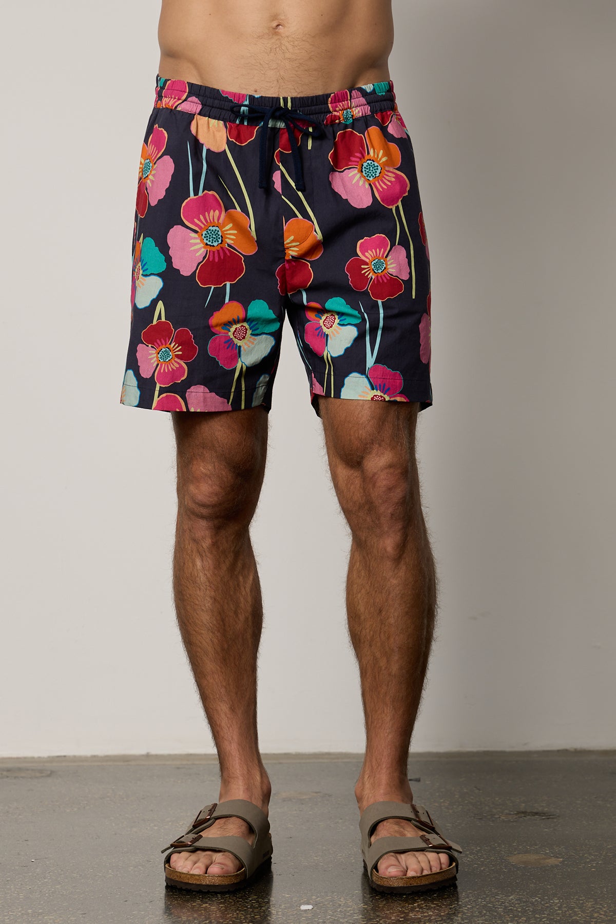   Colt Short front in bahama print with bold, multi colored floral pattern with dark background 
