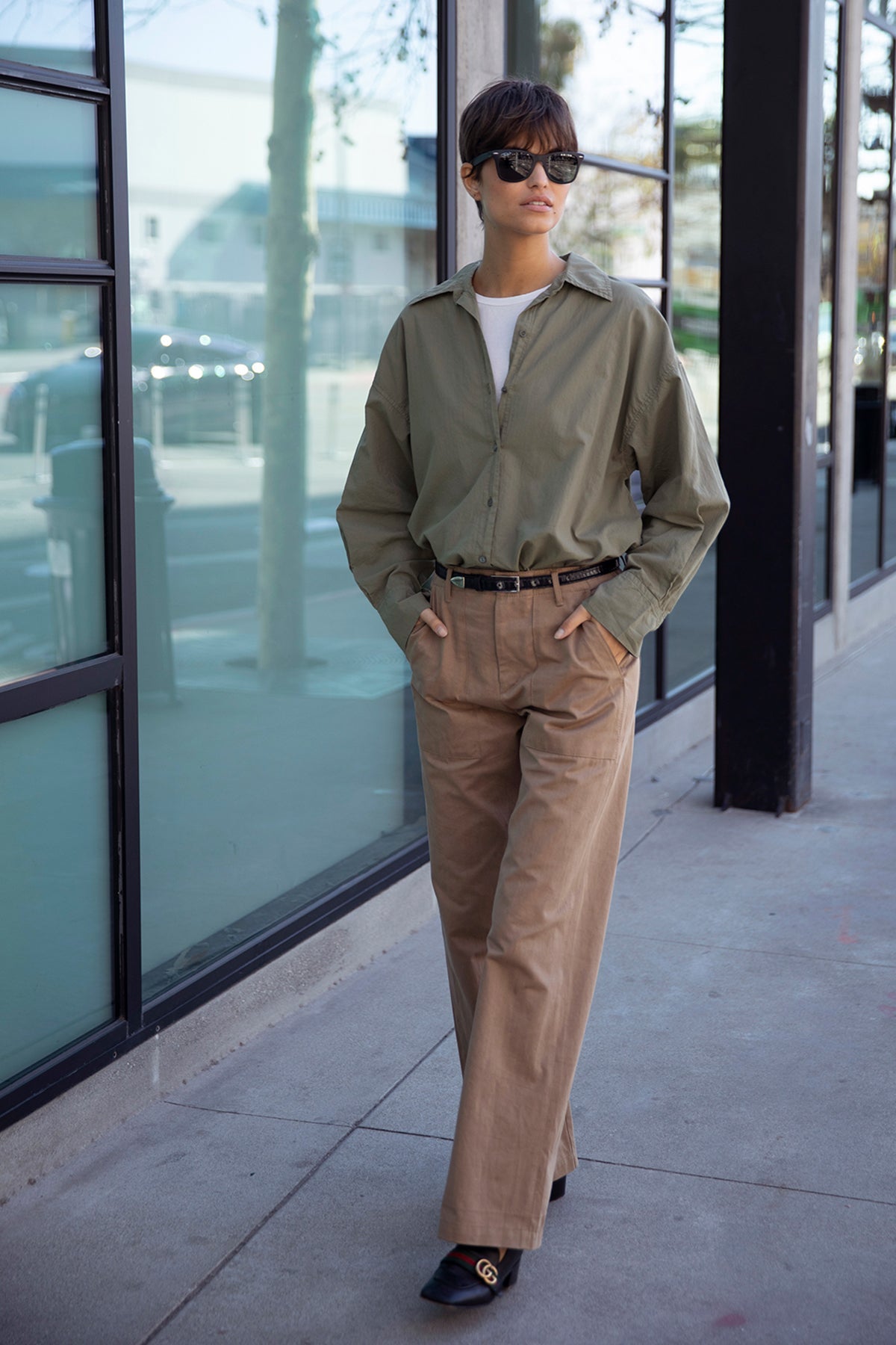 Redondo Shirt in thicket tucked into Ventura Pant side & back, model wearing sunglasses, black belt and black shoes, full length front-25870844231873