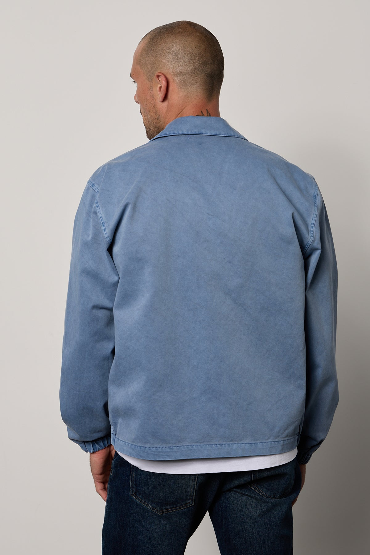   The back view of a man wearing a Velvet by Graham & Spencer ODIN SANDED TWILL ZIP-UP JACKET. 