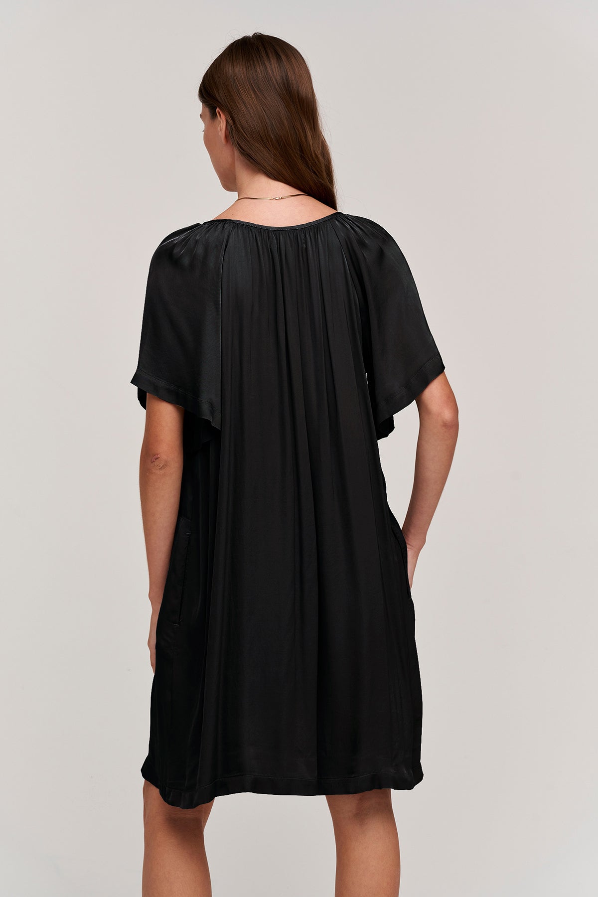   Suzanna satin viscose dress in black back. 