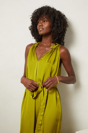 Tala dress in meadow green tied close up front
