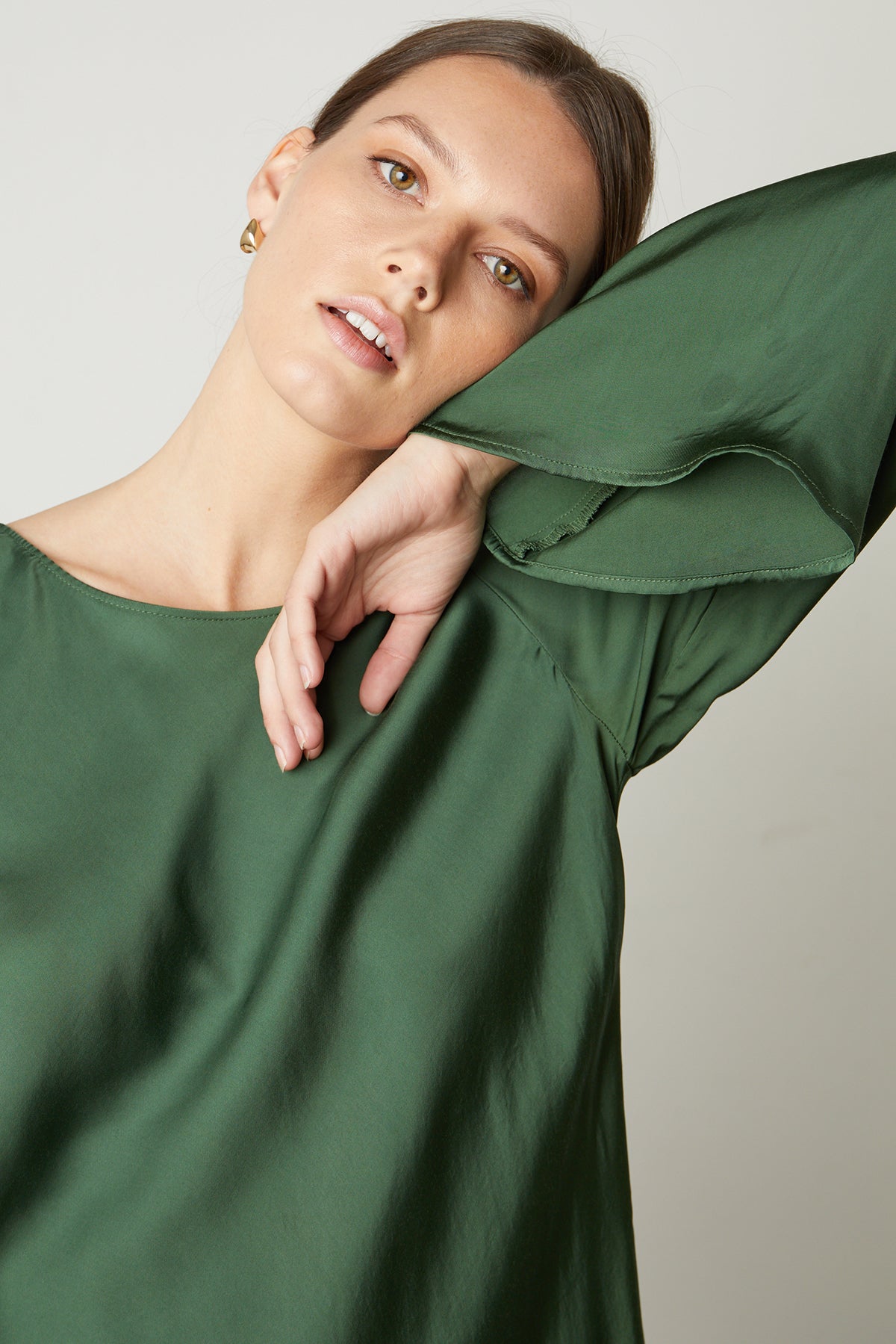   Catherine Satin Midi Dress in fern green close up front & sleeve 
