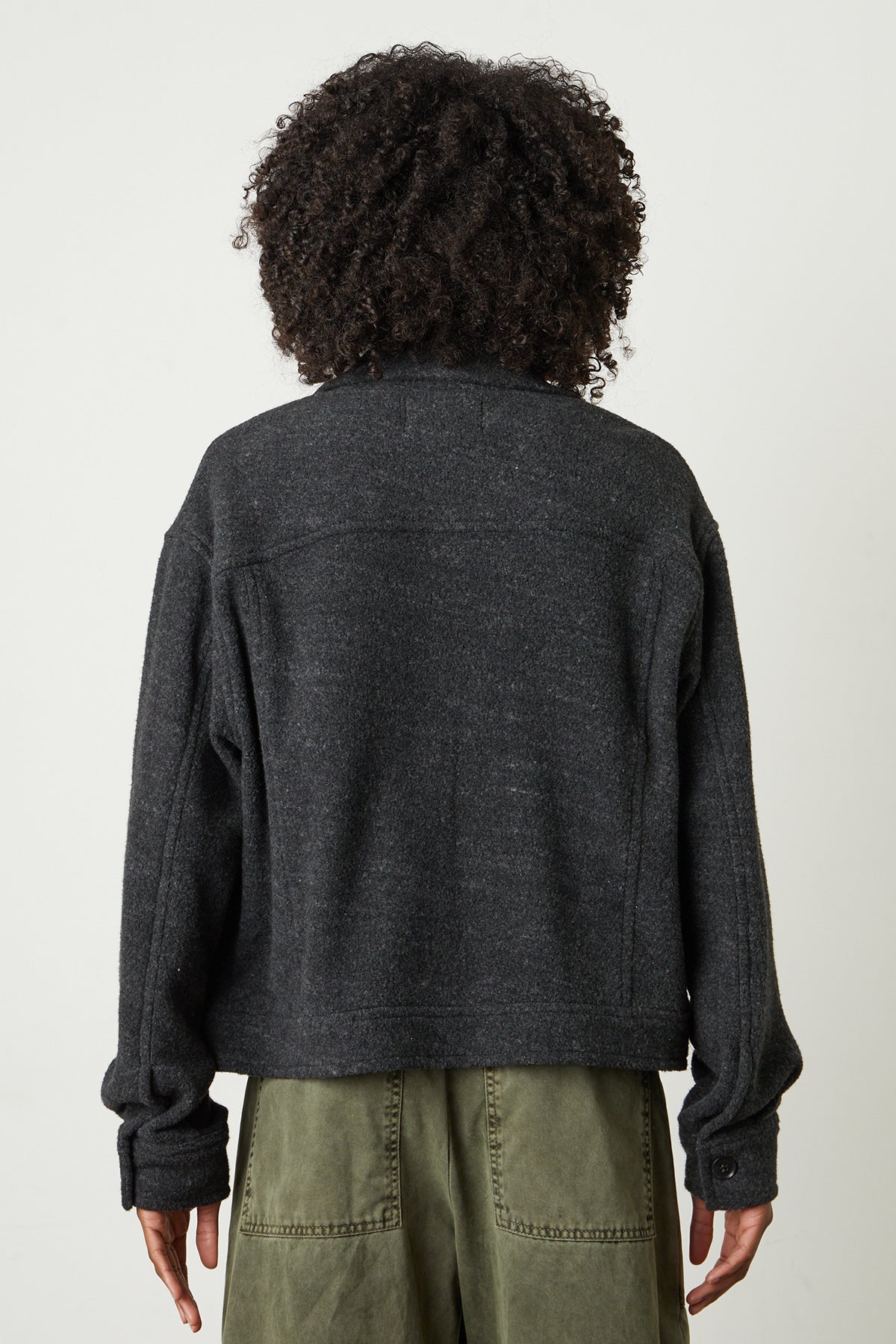   the back view of a woman wearing a Velvet by Graham & Spencer KAMERON FLEECE SHACKET. 