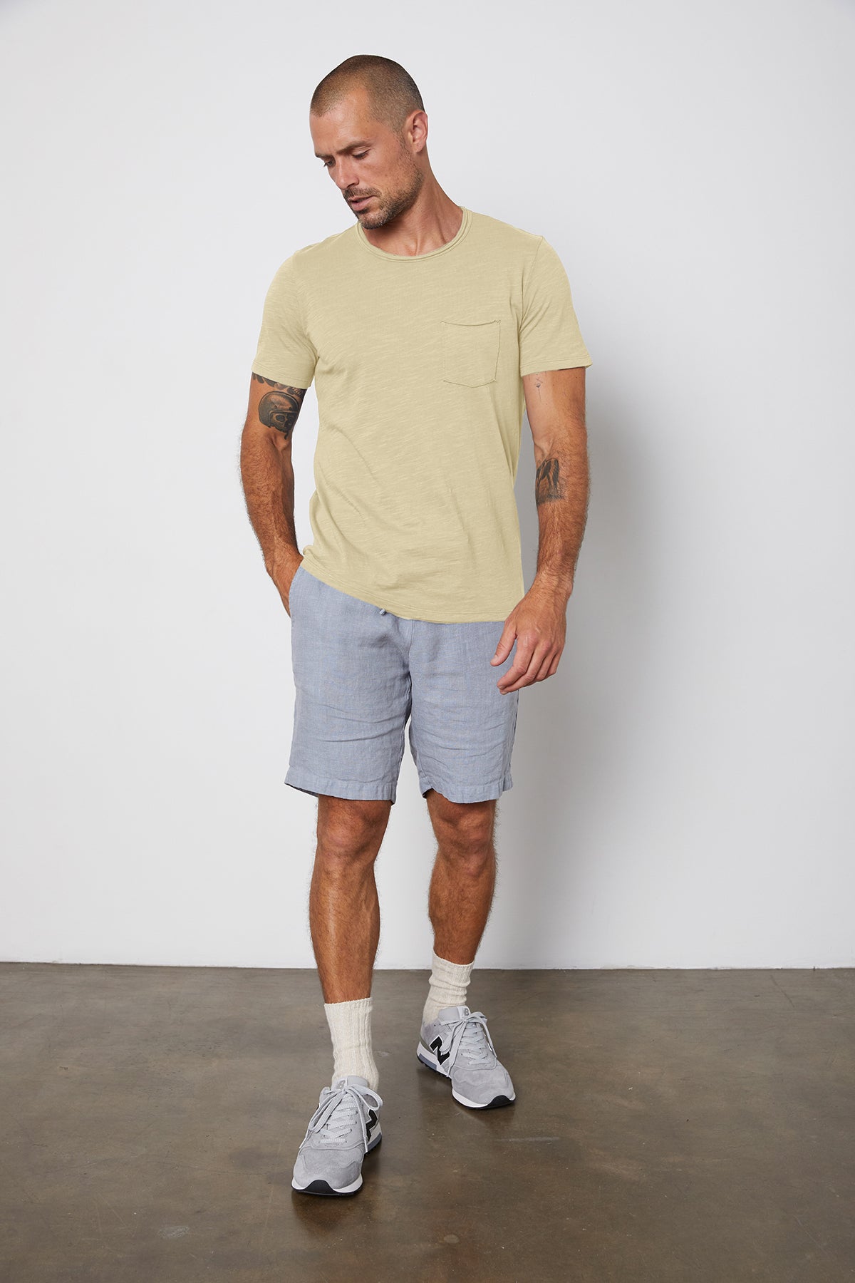   Chad Raw Edge Cotton Slub Pocket Tee in Olivine with Jonathan shorts in chambray front 