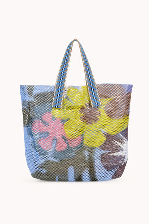 Small mesh tote in blue with multi colored flowers.