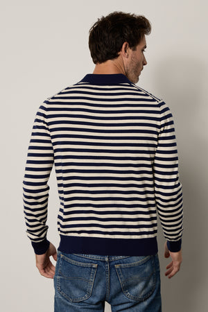 The back view of a man wearing a Velvet by Graham & Spencer RICKY STRIPED POLO sweater.