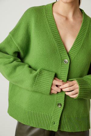 Aurora Button Front Cardigan in vibrant aloe green font close up detail