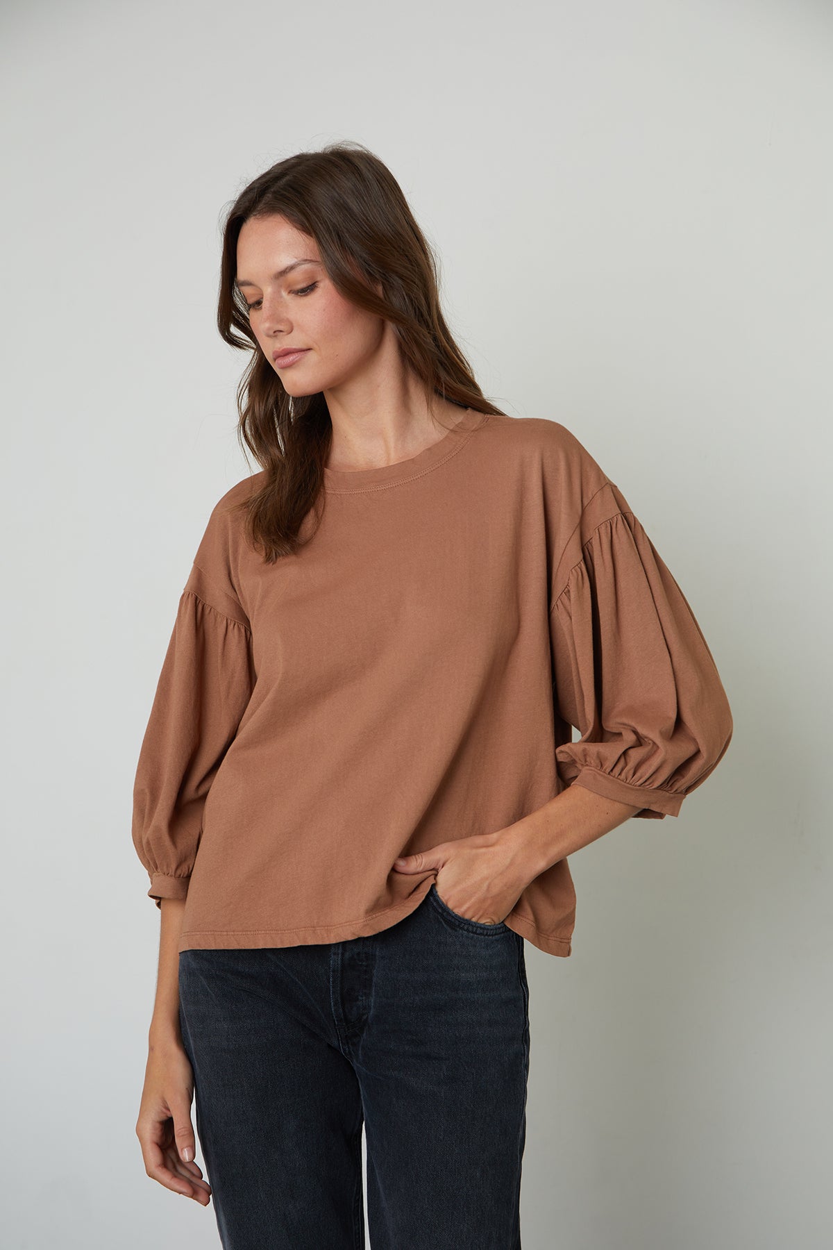  The PRUDY 3/4 SLEEVE TEE in tan, by Velvet by Graham & Spencer, adds volume to your outfit. 