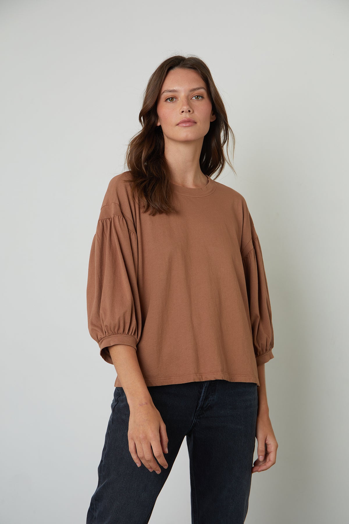   The Prudy 3/4 sleeve tee in tan brings volume to any outfit. 
