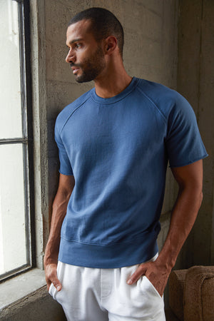 Keyon French Terry Sweatshirt Malachite with Chase Shorts in Salt with Model Looking Out Window
