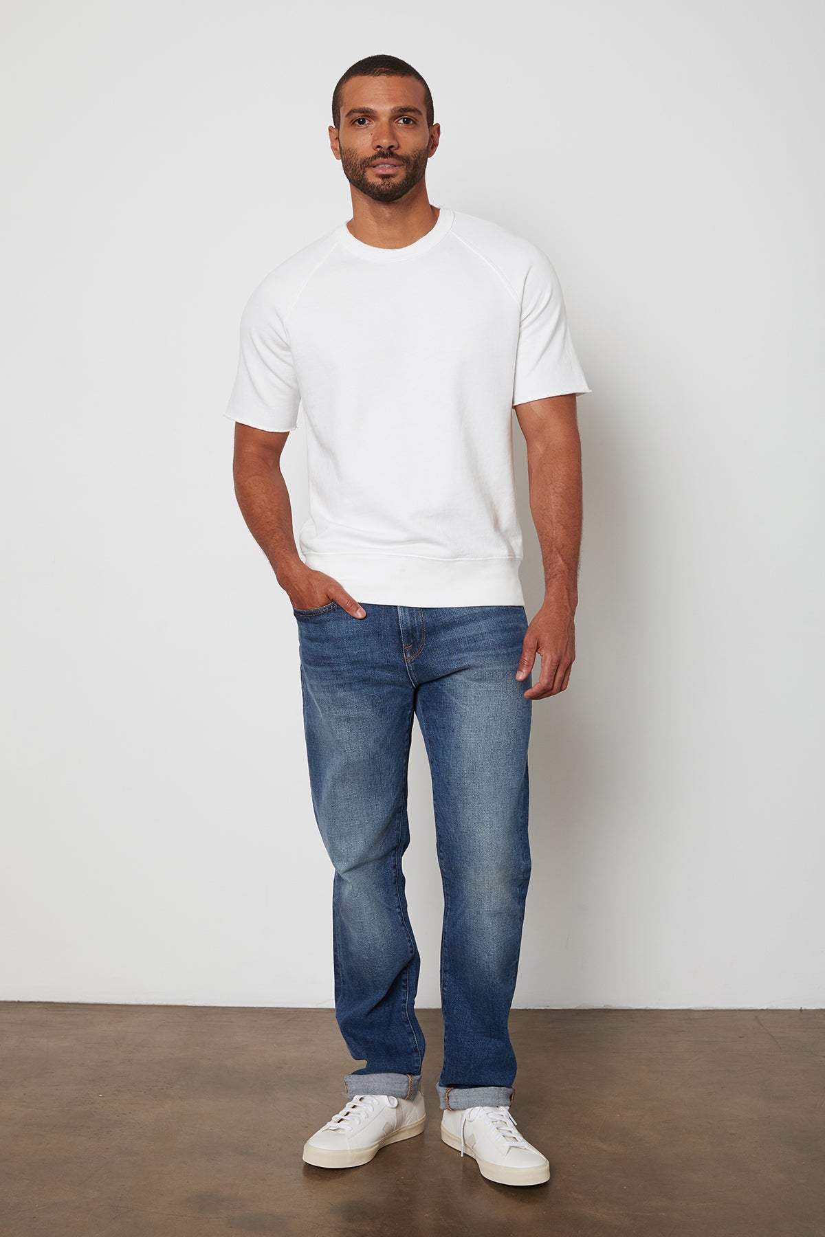 Keyon French Terry Sweatshirt with Model Standing Wearing Blue Denim-24705882849473
