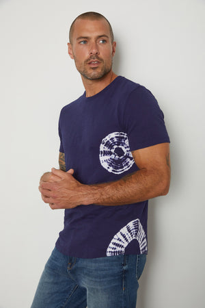 Asher in navy side tee