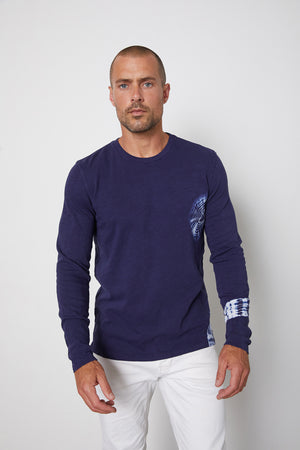 Caleb in navy front tee