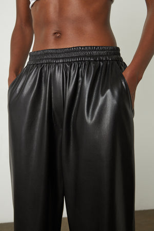 Jenna Vegan Leather Wide Leg Pant in black front waist detail
