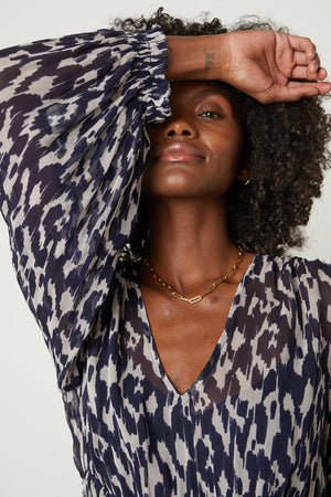 Kendra Printed Maxi Dress in calico print close up front detail