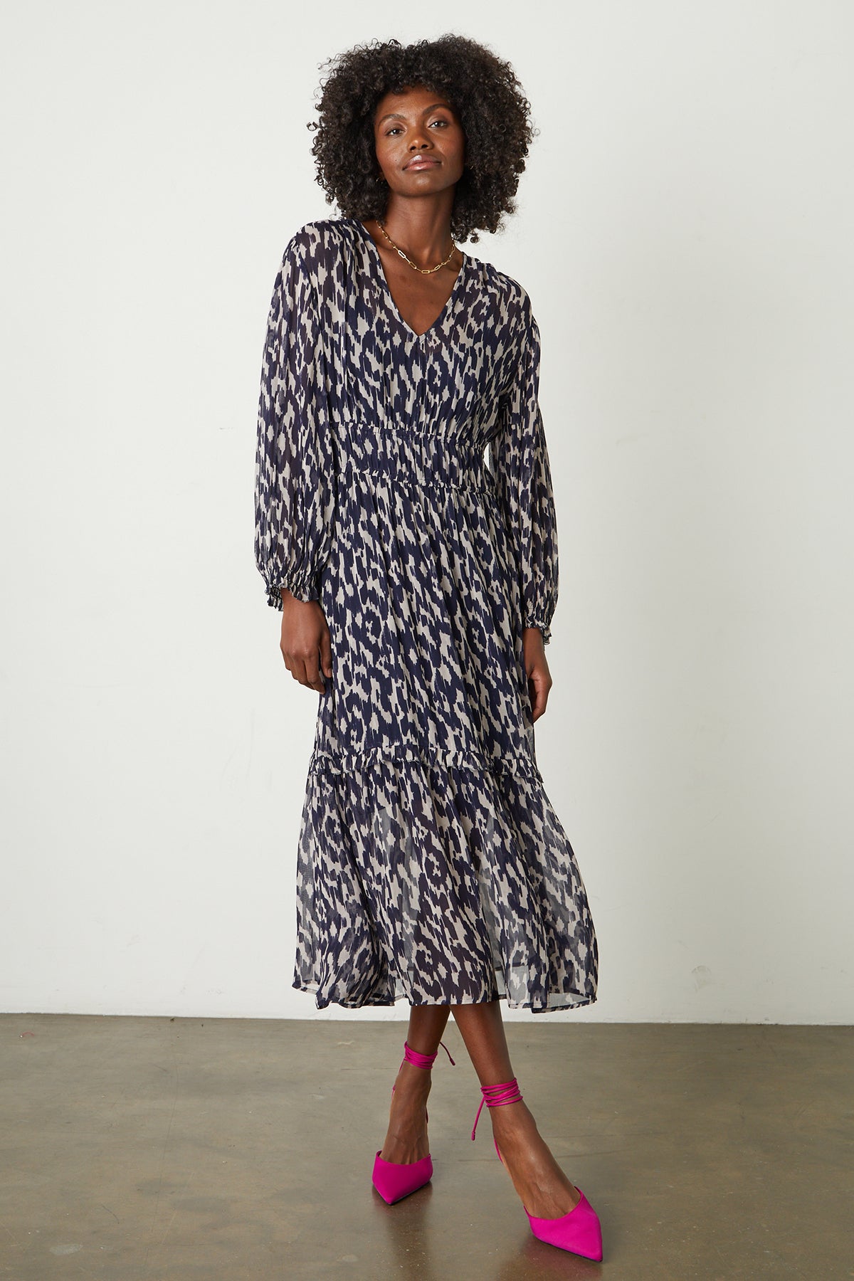 Kendra Printed Maxi Dress in calico print with hot pink heels full length front-25669297569985