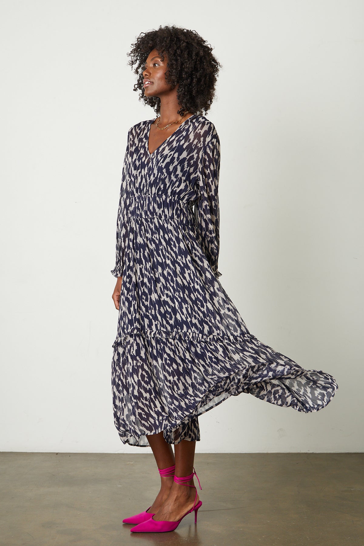 Kendra Printed Maxi Dress in calico print with hot pink heels full length front & side-25807853191361