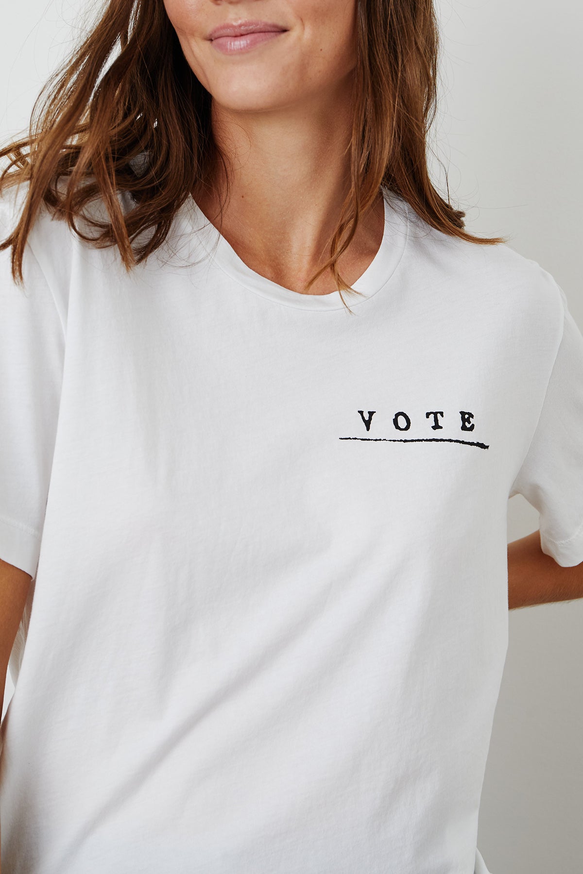   VOTE Unisex Tee in White with Black Vote text 