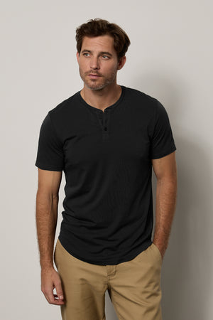 Fulton Short Sleeve Henley in black with Aiden pant in khaki front