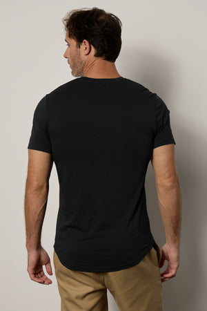 Fulton Short Sleeve Henley in black with Aiden pant in khaki back