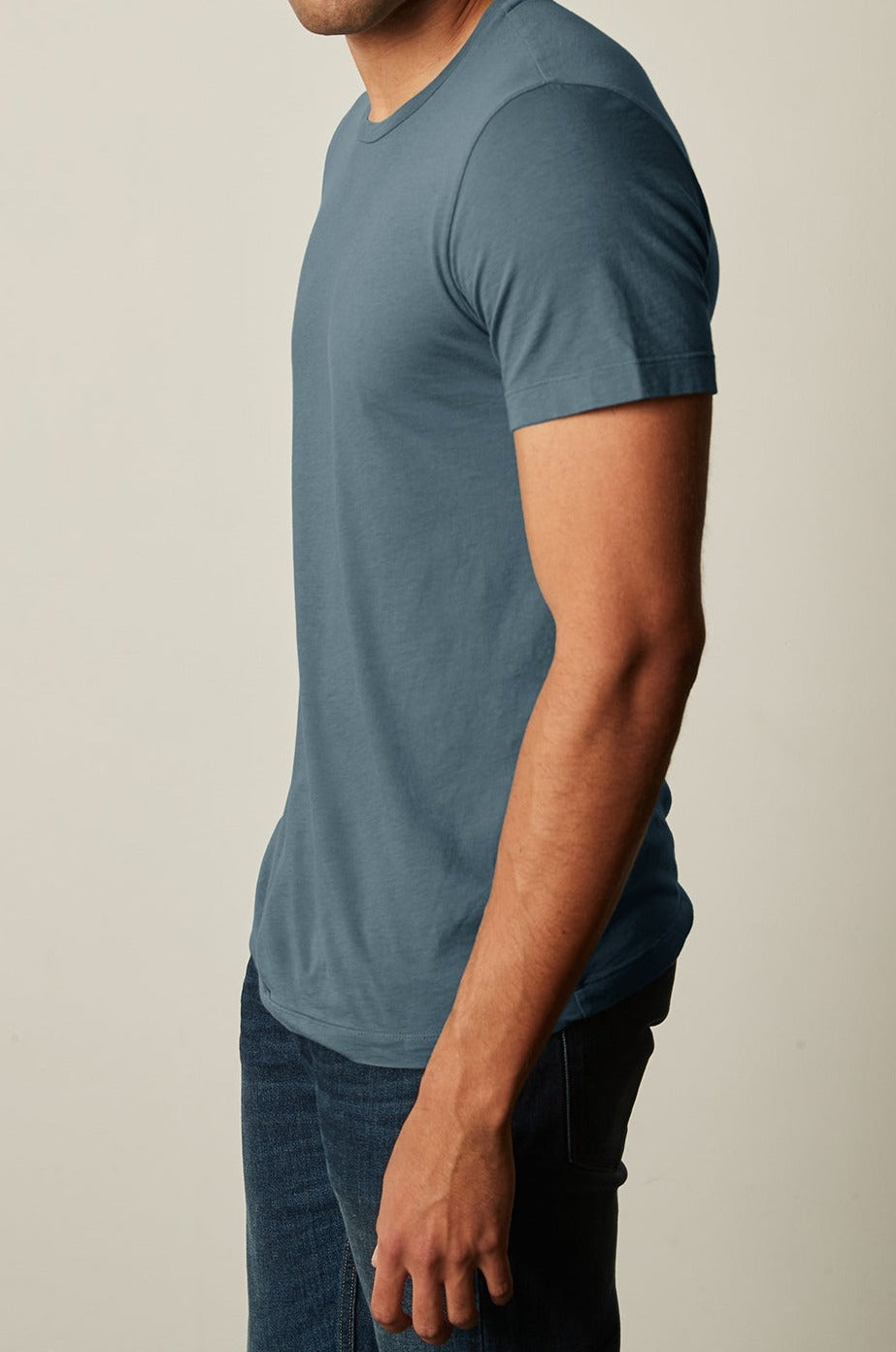   A man wearing a Velvet by Graham & Spencer HOWARD WHISPER CLASSIC CREW NECK TEE in lightweight cotton knit. 