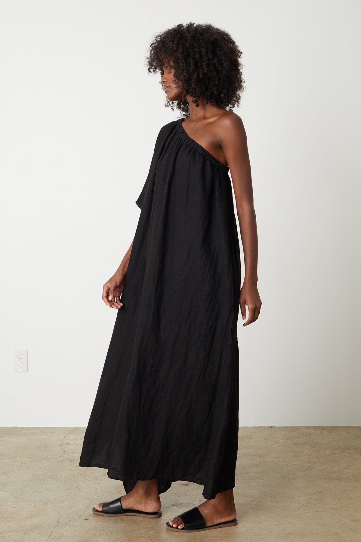   Andrea Linen Dress in black with black slides full length side 