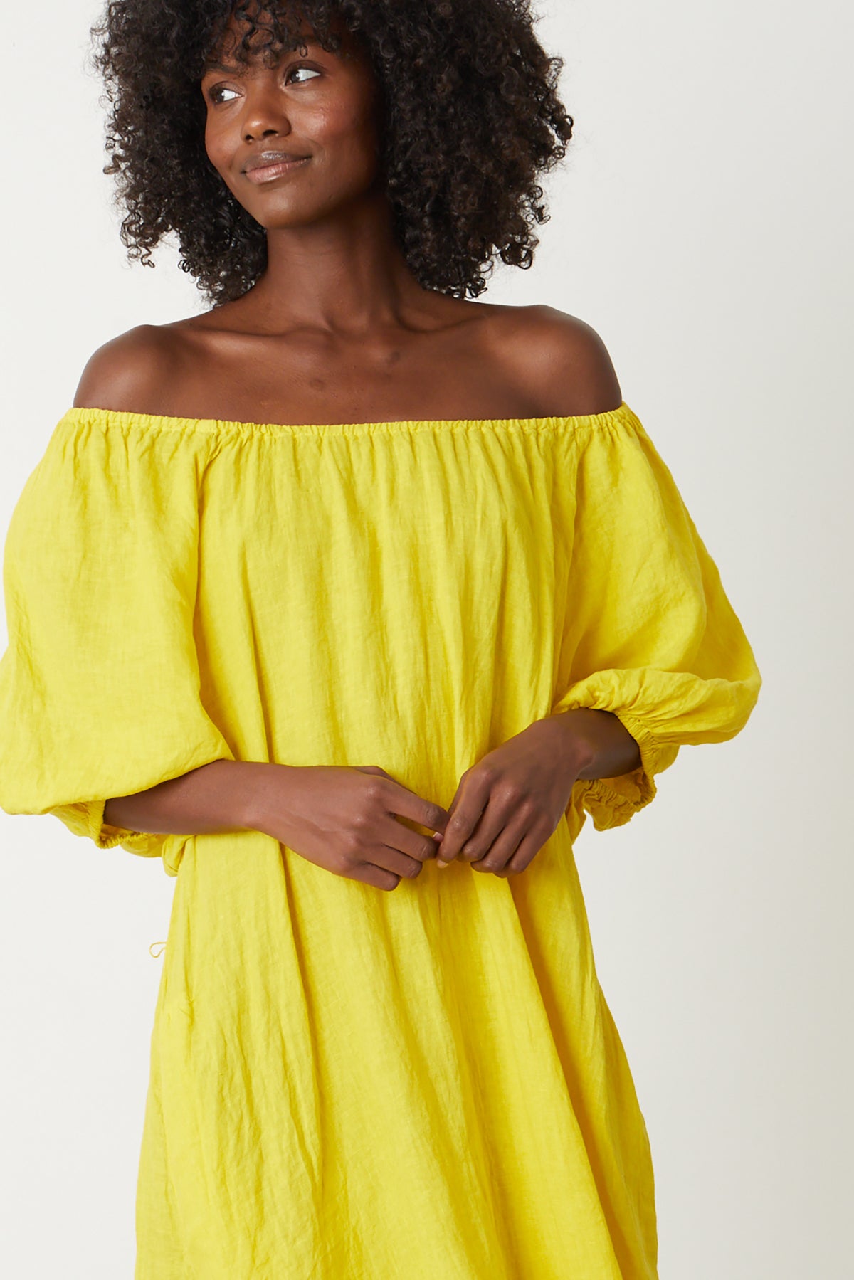   Elly Midi Dress in bright yellow sun colored linen unbelted front close up off shoulders 