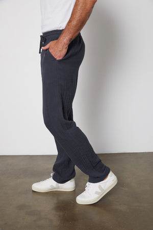 Ryan Drawstring Pant in Ink Side with Model's Hand in Pocket