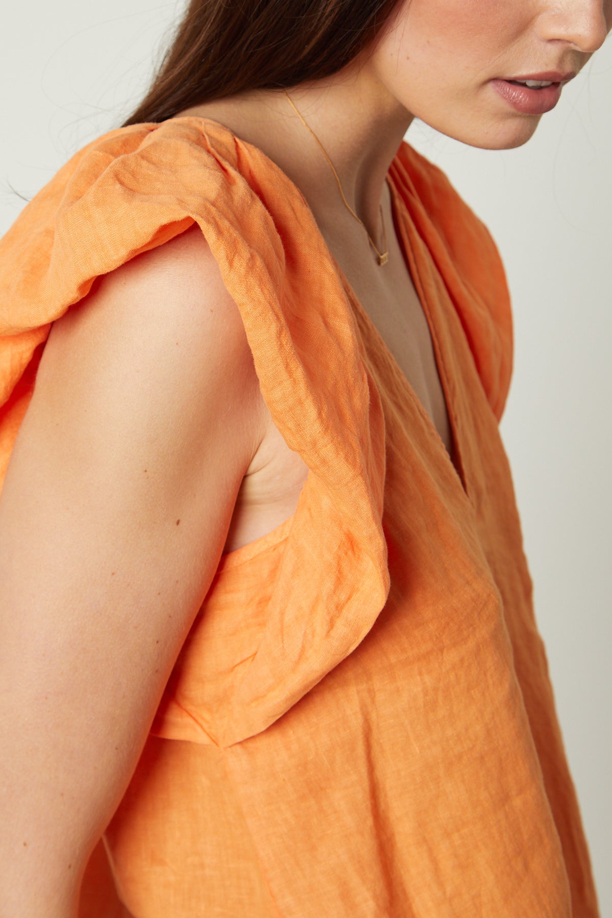   Ava Linen V-Neck Top in orange heat color close up detail sleeve 
