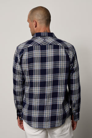 the back view of a man wearing a Velvet by Graham & Spencer LEONARD PLAID BUTTON-UP SHIRT.